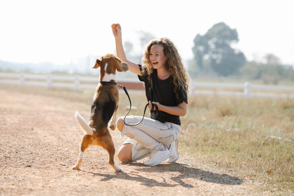 woman happy while dog training